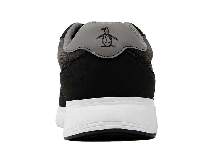 Tenis deportivos Penguin en color negro y gris con suela blanca y cordones negros.