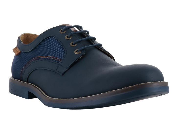 Zapato casual color marino para hombre con detalles en café y cierre de agujetas.