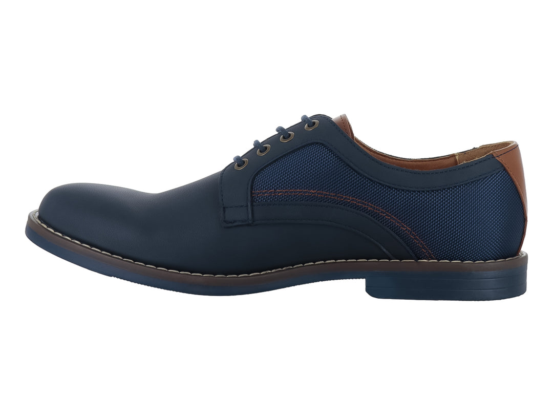 Zapato casual color marino para hombre con detalles en café y cierre de agujetas.