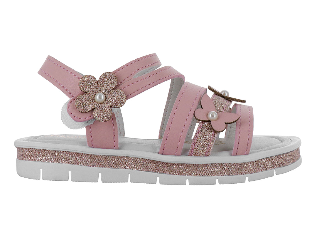 Sandalia rosa para niña con decoraciones de flores brillantes y perlas blancas.