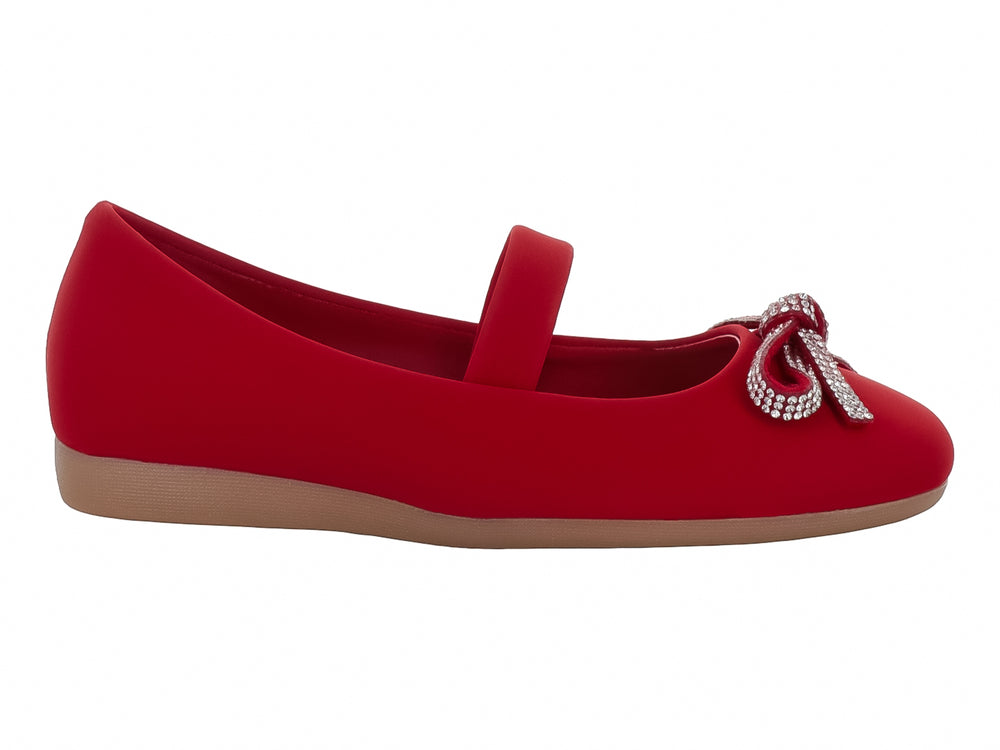 Zapato plano rojo para niña con correa y moño decorativo con brillantes en la punta.