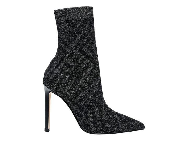 Botín Steve Madden color pewter con tejido brillante, punta afilada y tacón alto delgado.