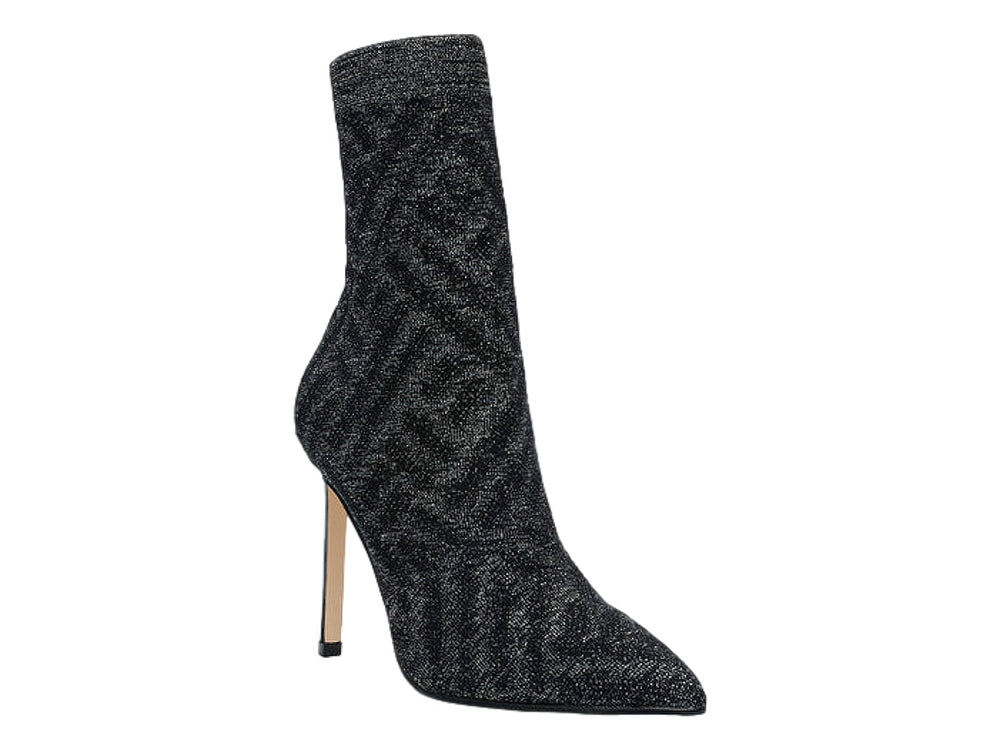 Botín Steve Madden color pewter con tejido brillante, punta afilada y tacón alto delgado.