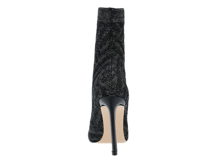 Botín Steve Madden color pewter con tejido brillante, punta afilada y tacón alto delgado.