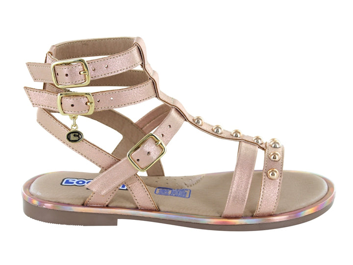 Sandalia gladiadora color oro con correas ajustables y suela iridiscente para Niña.