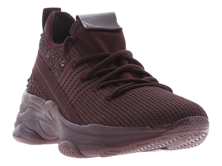 Tenis deportivos Madden Girl en color burgundy con tejido transpirable, detalles brillantes y suela robusta.