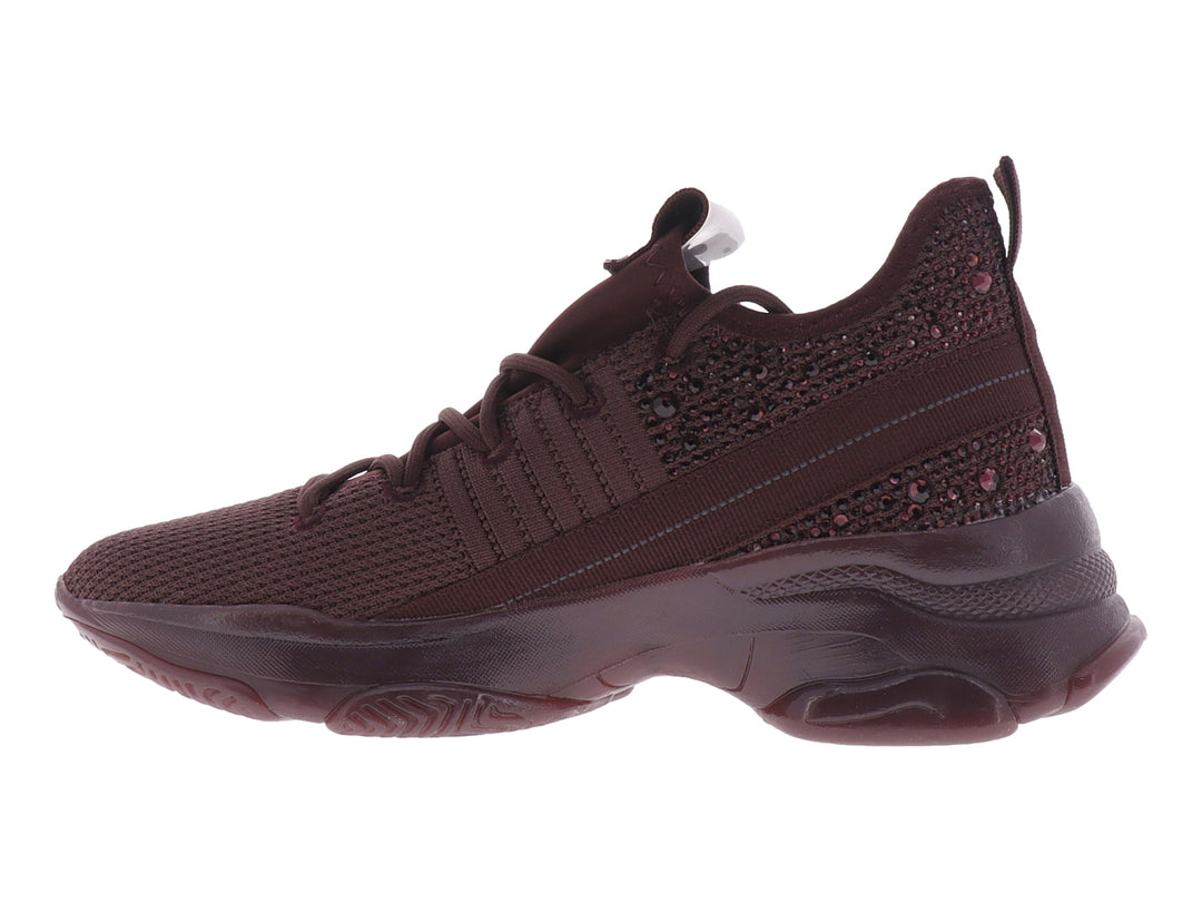 Tenis deportivos Madden Girl en color burgundy con tejido transpirable, detalles brillantes y suela robusta.