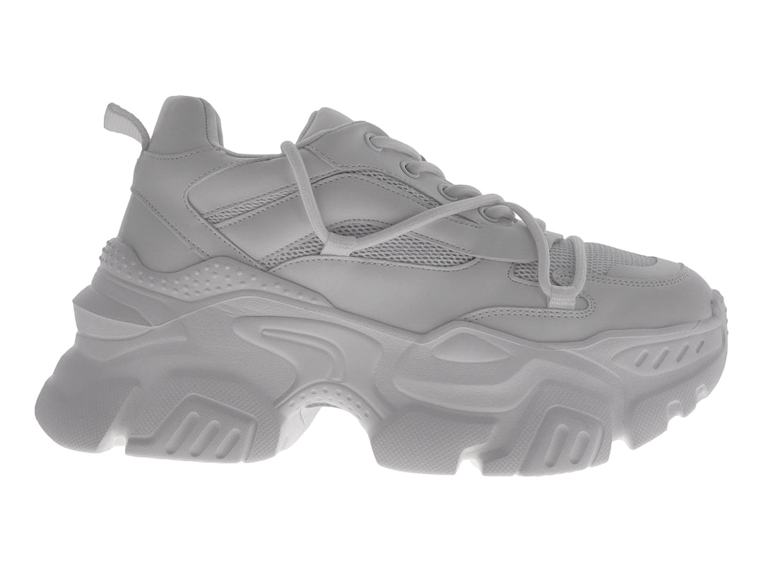 Tenis blancos de plataforma estilo chunky con suela robusta y detalles de malla.