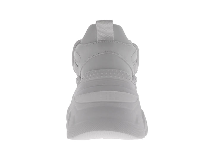 Tenis blancos de plataforma estilo chunky con suela robusta y detalles de malla.