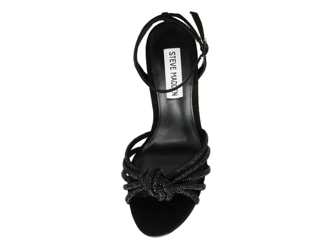 Sandalia negra de tacón alto Steve Madden con tiras brillantes decoradas con cristales y un nudo en la parte frontal.