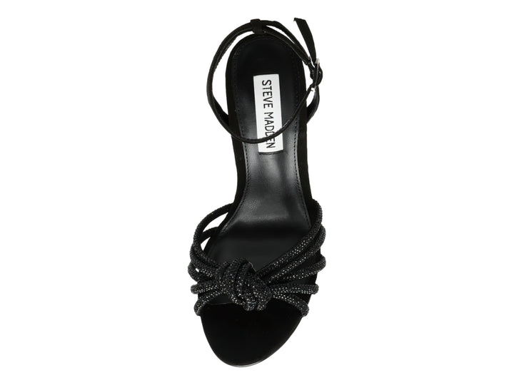 Sandalia negra de tacón alto Steve Madden con tiras brillantes decoradas con cristales y un nudo en la parte frontal.