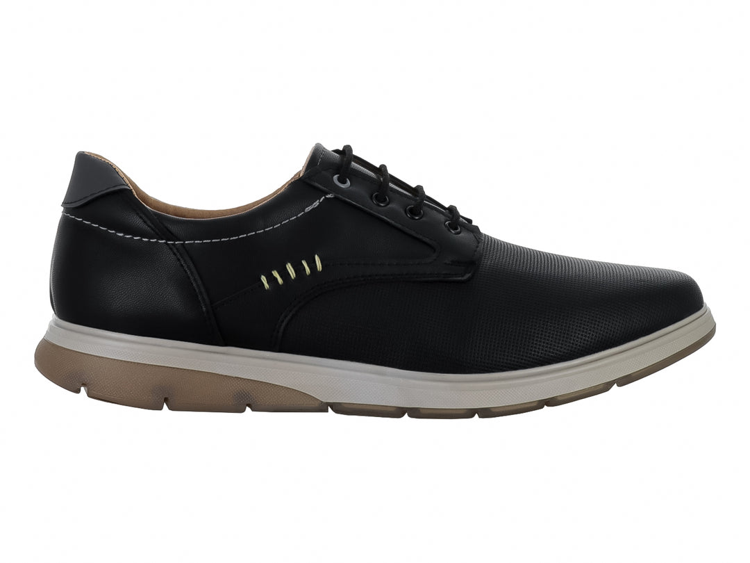Zapato casual color negro para hombre con cordones y suela blanca y café.