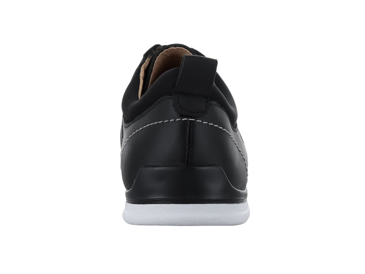 Zapato casual color negro con suela blanca y cordones para Hombre.
