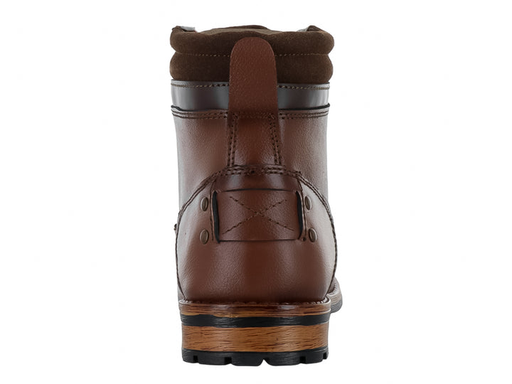 Bota casual color miel con cordones y suela bicolor negra y café.