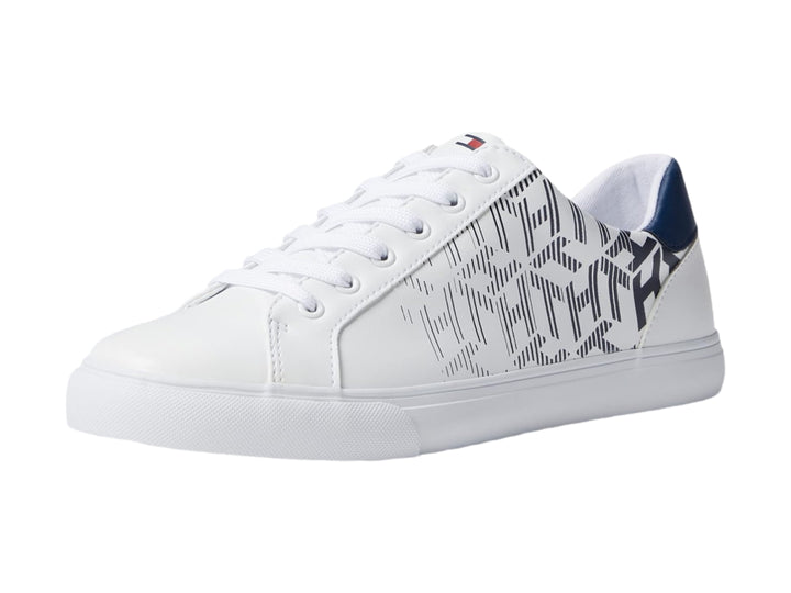 Tenis Tommy Hilfiger color blanco con estampado geométrico en azul marino y suela blanca.