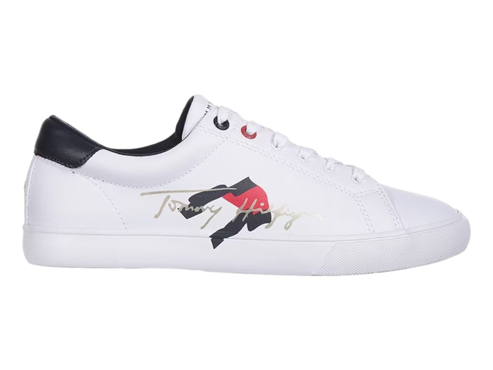 Tenis blancos Tommy Hilfiger para mujer con detalles en negro y logotipo en el costado.