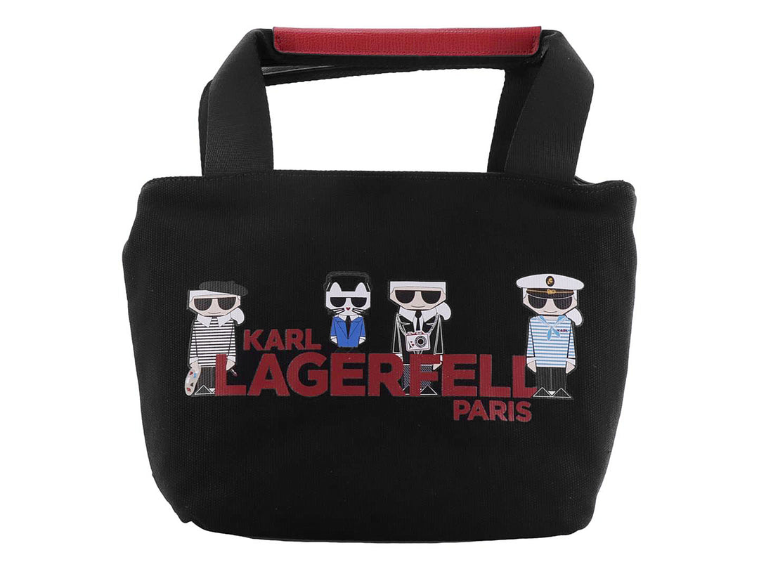 Bolso negro de tela con asas y estampado de personajes de Karl Lagerfeld y texto en rojo.