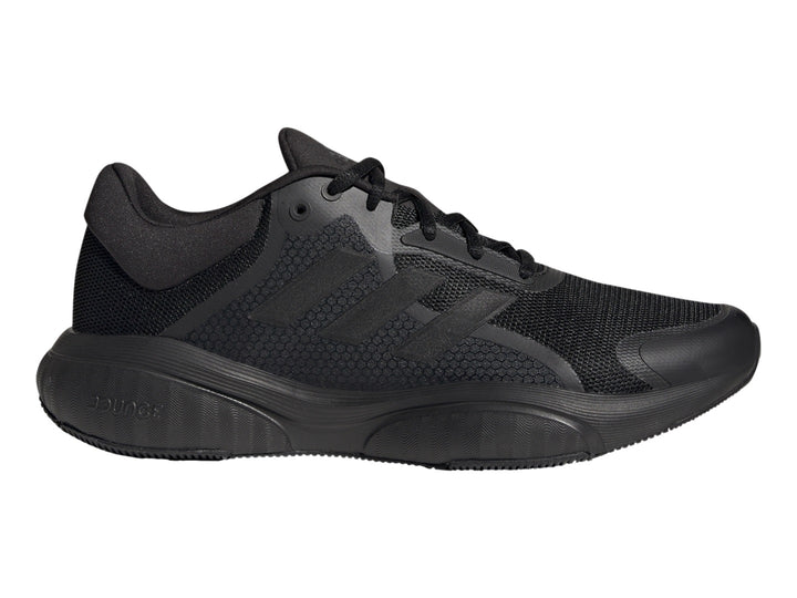 Tenis deportivos Adidas GX2000 en color negro total, vista lateral sobre fondo blanco.