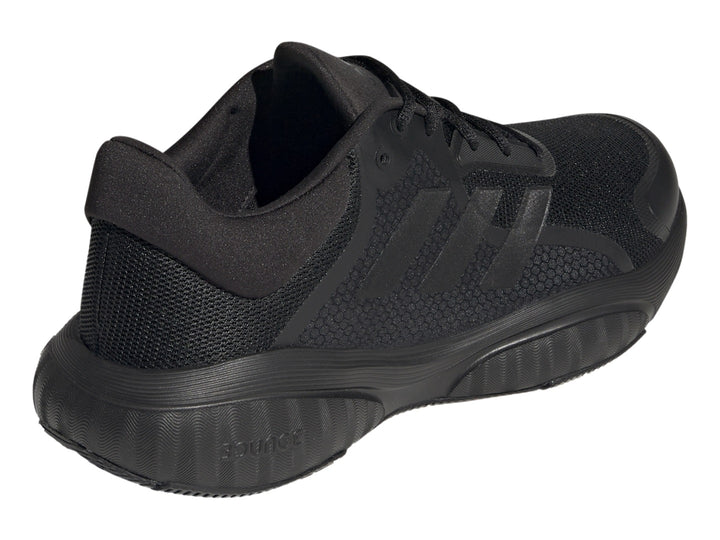 Tenis deportivos Adidas GX2000 en color negro total, vista lateral sobre fondo blanco.