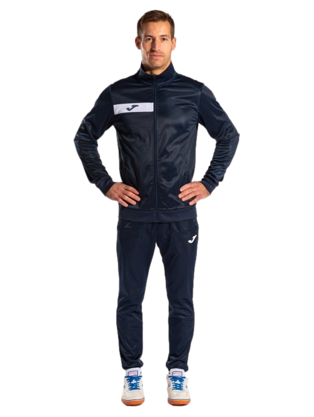 Conjunto deportivo Joma azul marino para hombre, incluye chaqueta y pantalón.