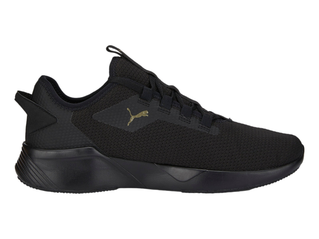Tenis PUMA Retaliate 2 color negro con diseño deportivo y malla transpirable.