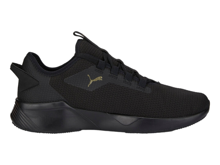 Tenis PUMA Retaliate 2 color negro con diseño deportivo y malla transpirable.