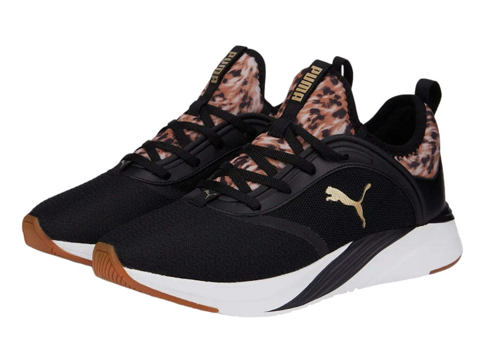 Tenis PUMA negros con detalles en animal print dorado y suela blanca para mujer.