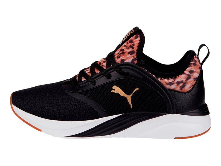 Tenis PUMA negros con detalles en animal print dorado y suela blanca para mujer.