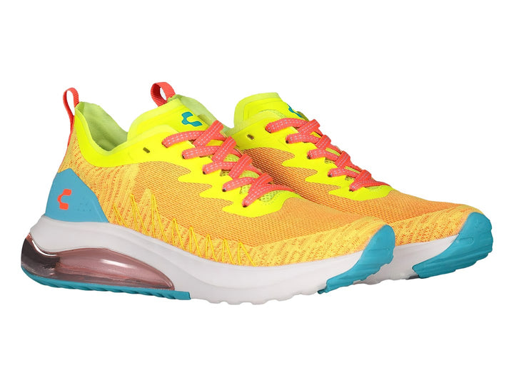 Tenis deportivos Charly color amarillo con detalles en aqua, blanco y cordones rosa.
