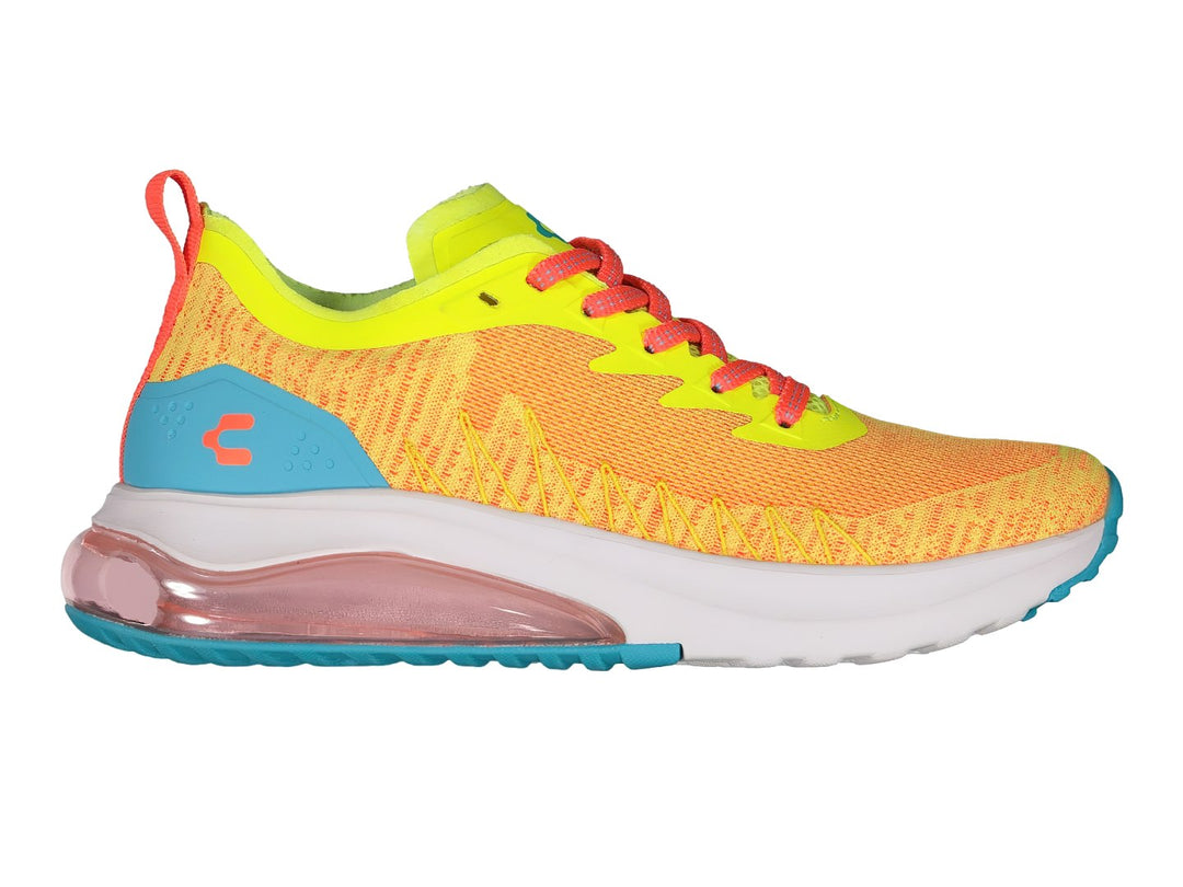 Tenis deportivos Charly color amarillo con detalles en aqua, blanco y cordones rosa.