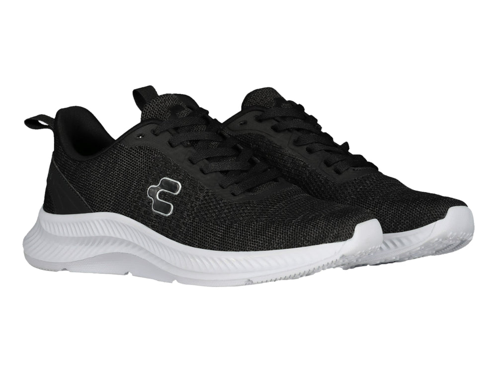 Tenis deportivos Charly color negro con suela blanca y logotipo lateral blanco.