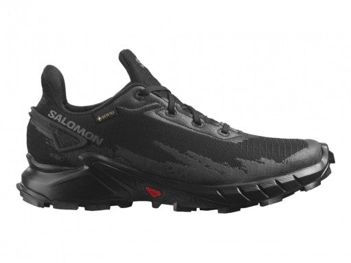 Tenis deportivos Salomon Alphacross en color negro total con suela robusta para trail running.