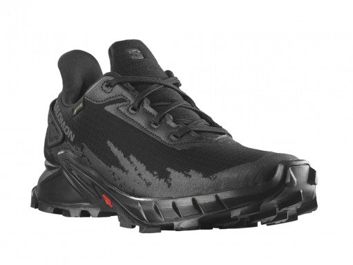 Tenis deportivos Salomon Alphacross en color negro total con suela robusta para trail running.