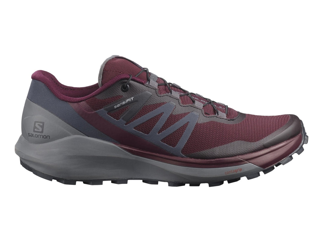 Tenis deportivos Salomon Sense Ride 4 en color vino y gris con suela para trail running.