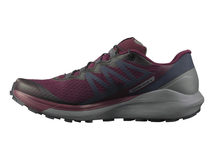 Tenis deportivos Salomon Sense Ride 4 en color vino y gris con suela para trail running.