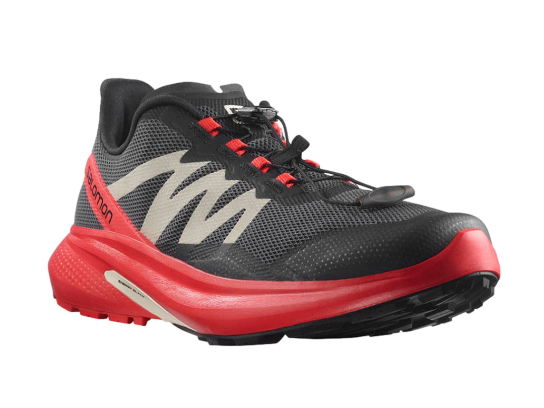 Tenis deportivos Salomon Hypulse en colores gris, rojo y negro con suela amortiguada.