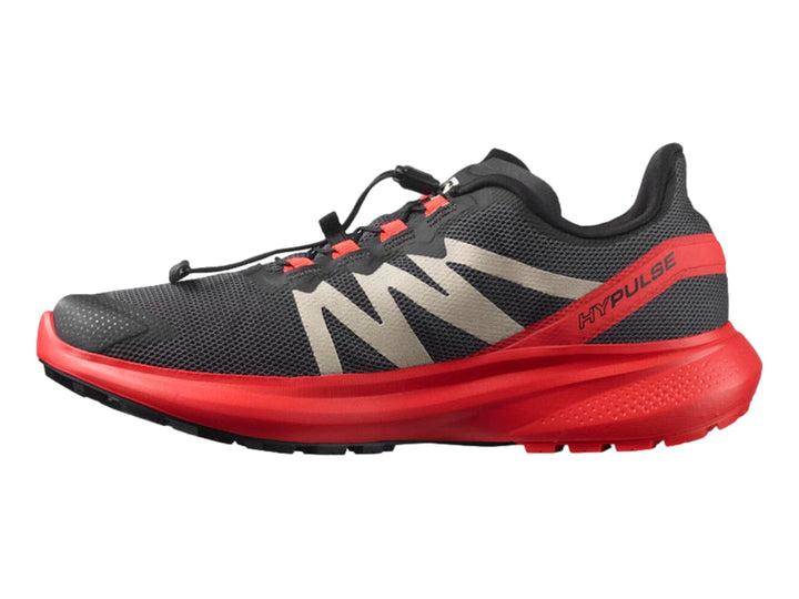 Tenis deportivos Salomon Hypulse en colores gris, rojo y negro con suela amortiguada.