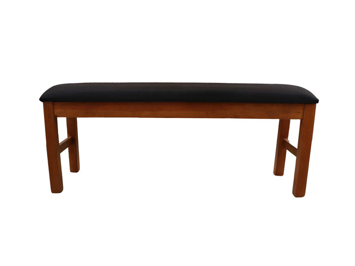 Conjunto de comedor con mesa de madera, cuatro sillas negras y una banca negra.