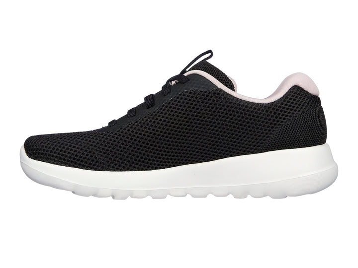 Tenis deportivos Skechers color negro con detalles en rosa y suela blanca.
