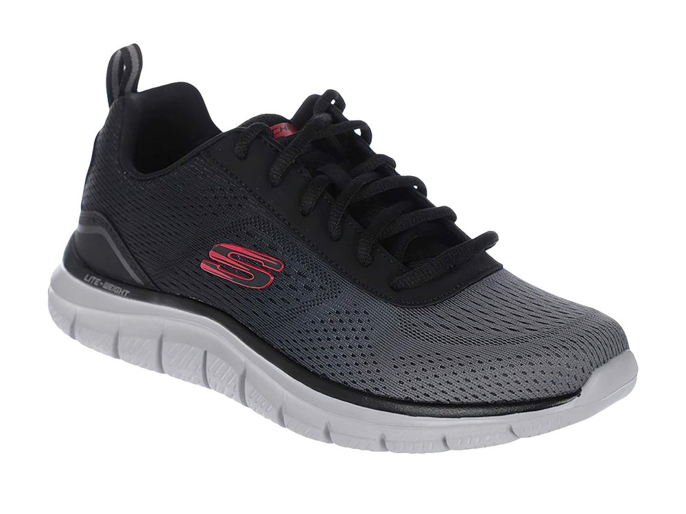 Zapato deportivo Skechers Track en colores negro y gris con suela blanca ligera.