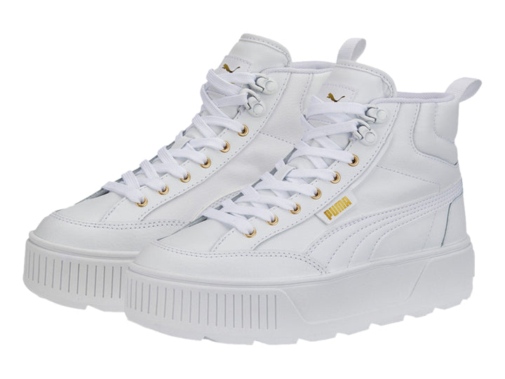 Tenis PUMA Karmen Mid color blanco con suela de plataforma y detalles dorados en los ojetes.