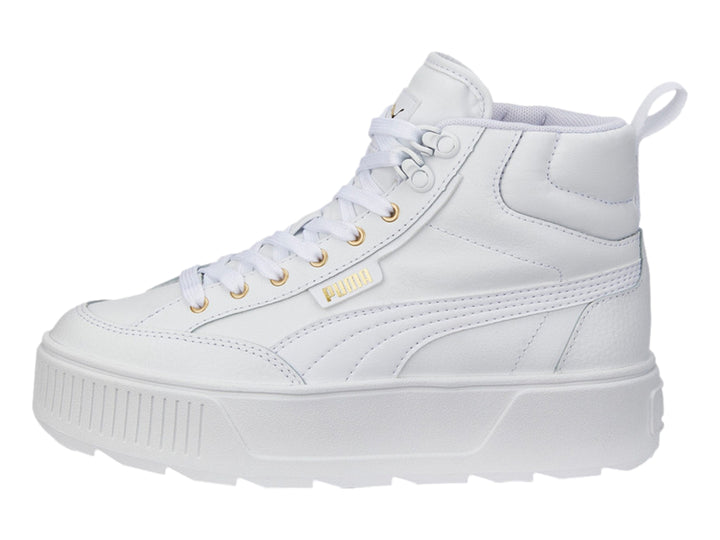 Tenis PUMA Karmen Mid color blanco con suela de plataforma y detalles dorados en los ojetes.