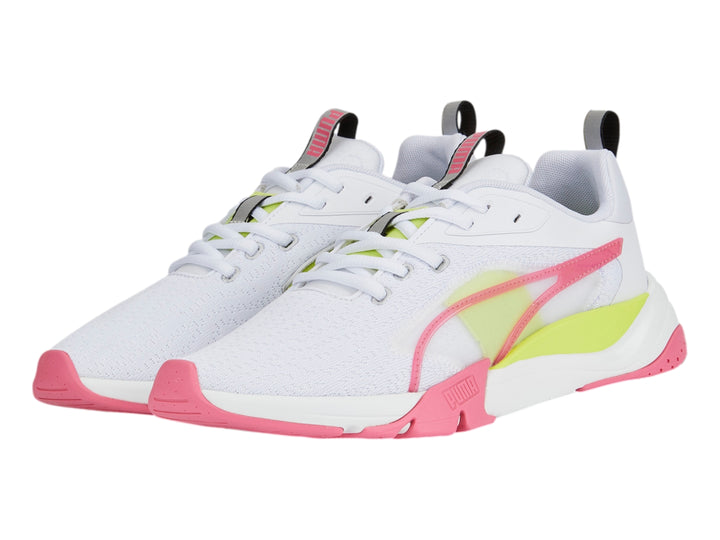 Tenis deportivos Puma blancos con detalles en verde lima y rosa