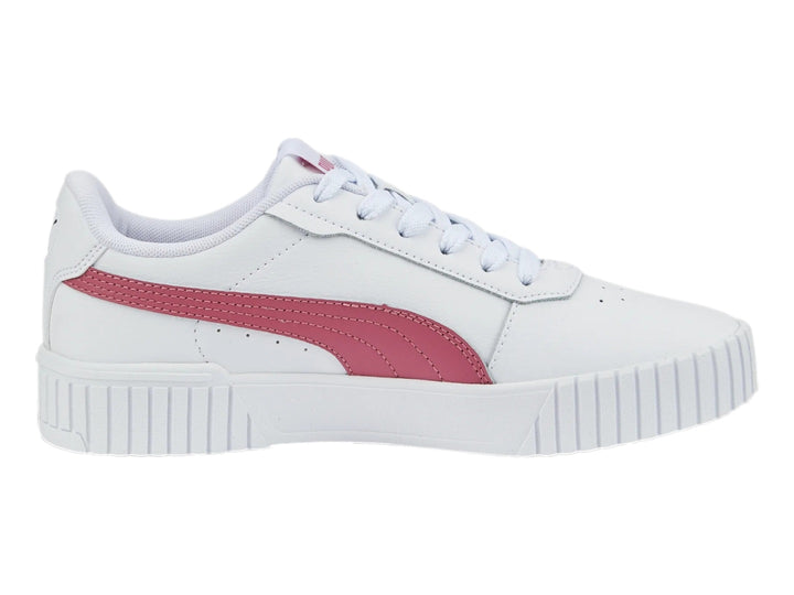 Tenis PUMA Carina 2.0 blancos con franja rosa y suela de plataforma blanca.