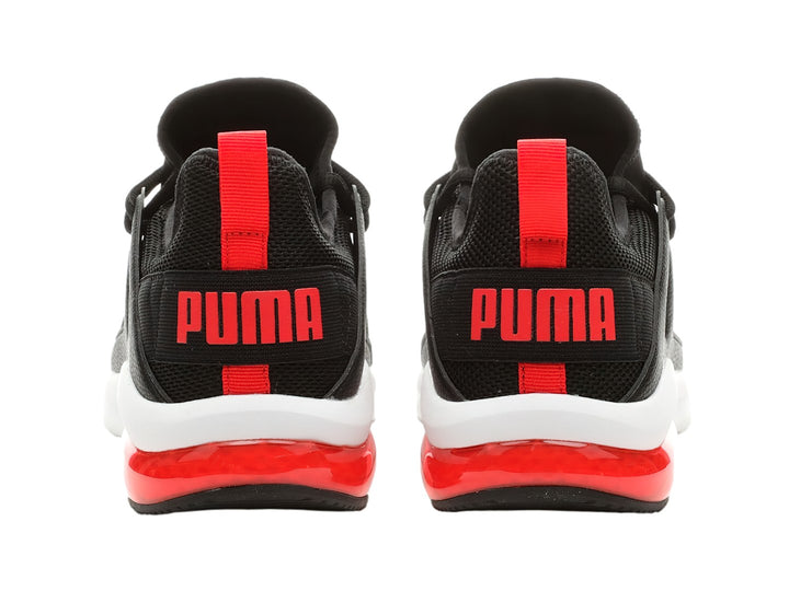 Tenis PUMA Electron 2.0 color negro con suela blanca y detalle rojo en el talón.
