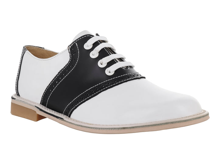 Zapato infantil marca Elefante en colores blanco y negro con agujetas blancas y suela color beige.