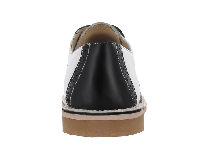 Zapato infantil marca Elefante en colores blanco y negro con agujetas blancas y suela color beige.