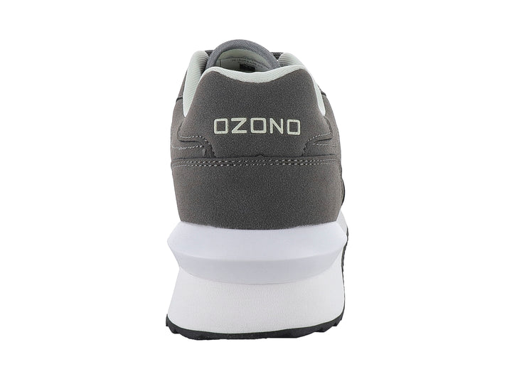 Tenis deportivos marca Capa de Ozono en color gris con detalles blancos y suela blanca.