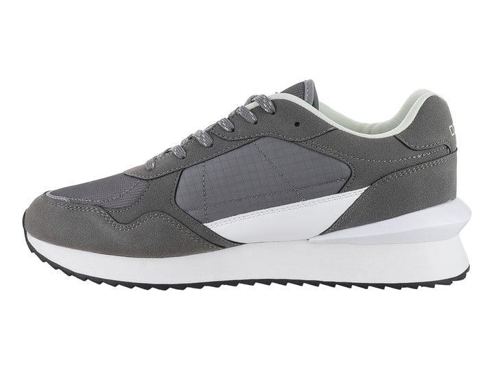 Tenis deportivos marca Capa de Ozono en color gris con detalles blancos y suela blanca.