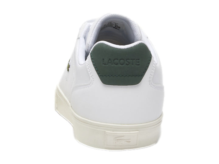 Tenis Lacoste Lerond Pro de cuero blanco con detalle verde en el talón y logotipo del cocodrilo lateral.